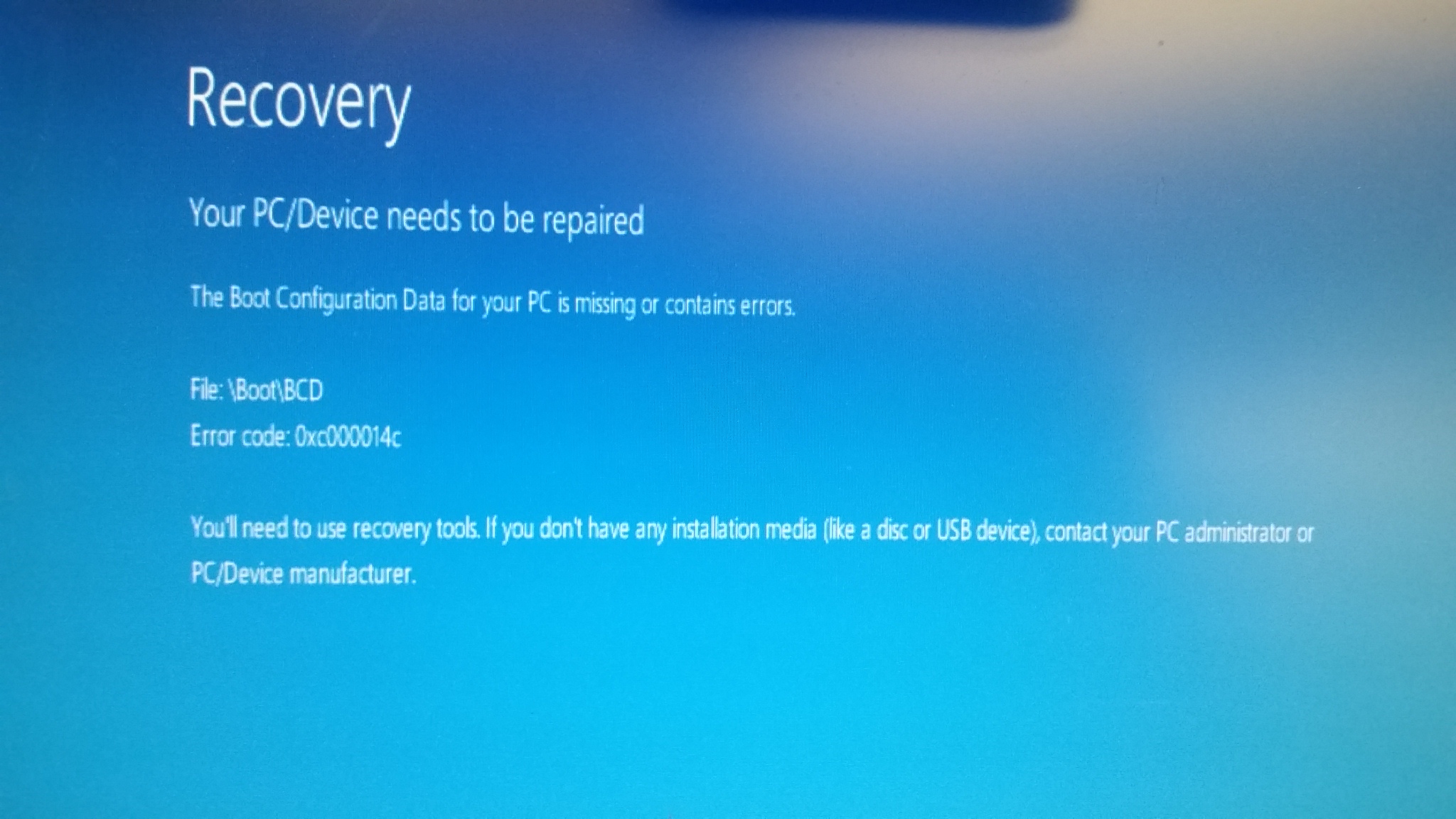 Insert the recovery disc or Win10 USB media into your computer.